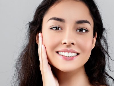 Healthy teeth smile young model with brunette hair beauty